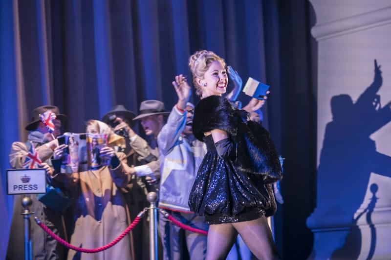 Glitz and glamour: the dizzy girlfriend played by Katrina Lyndon. Image by Johan Persson.